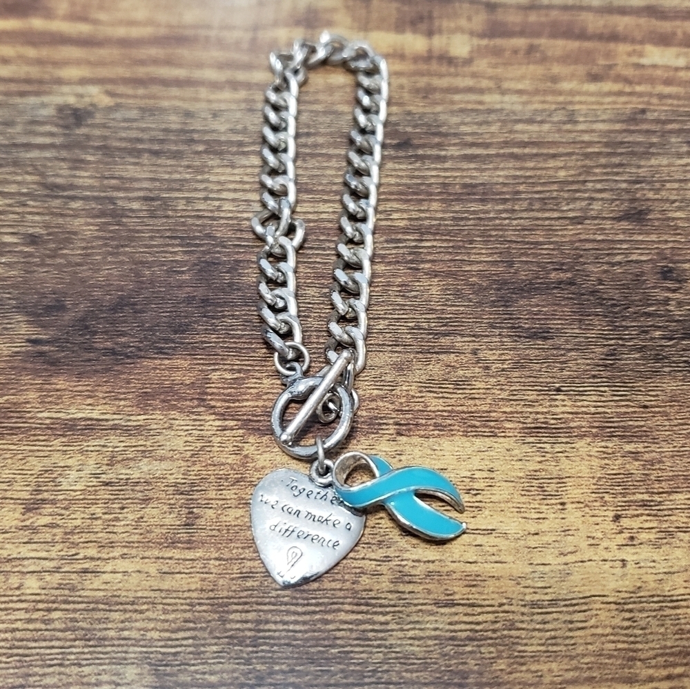 light blue ribbon awareness bracelet together we can make a difference